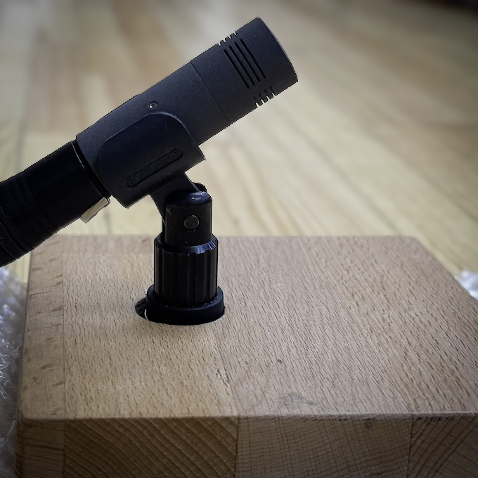 Schoeps MK41 (super cardioid) placed on the ground, facing backwards